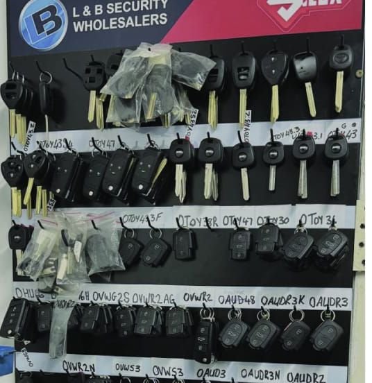 Kazin Keys' coded remote board, each row hand-labelled with its key blank code