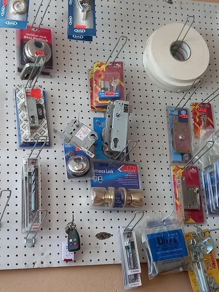 Padlocks, entrance locks, mortice locks and cylinders on the display board at Kazin Keys