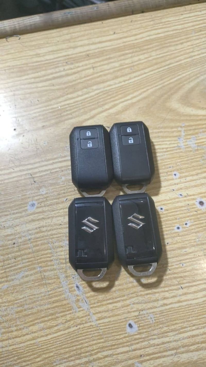 Four Suzuki smart keys on the workbench